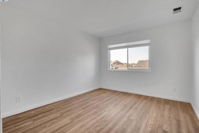 empty room featuring light hardwood / wood-style floors