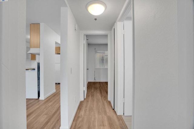 hallway with light wood-type flooring