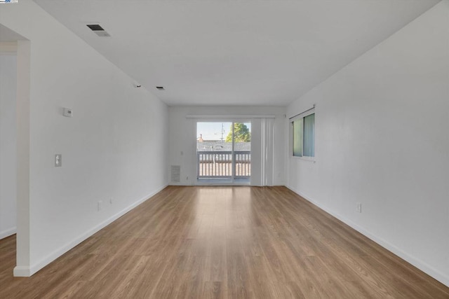 unfurnished room featuring light hardwood / wood-style floors