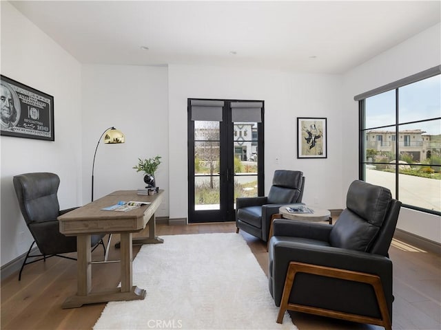 office area featuring french doors and wood-type flooring