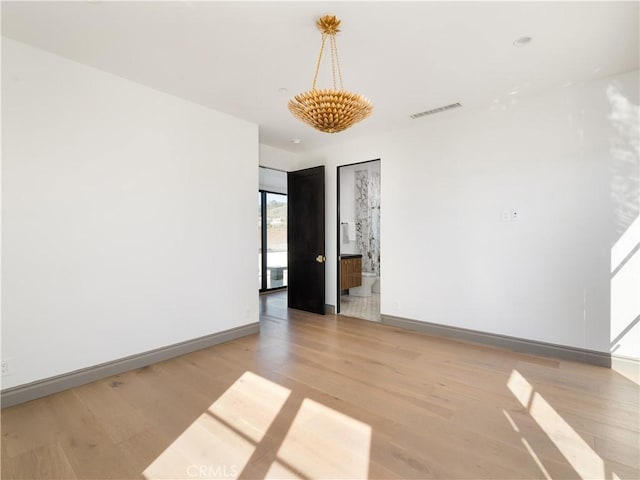 empty room featuring light hardwood / wood-style floors