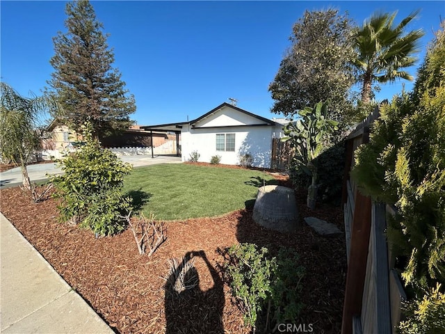 view of yard with a carport