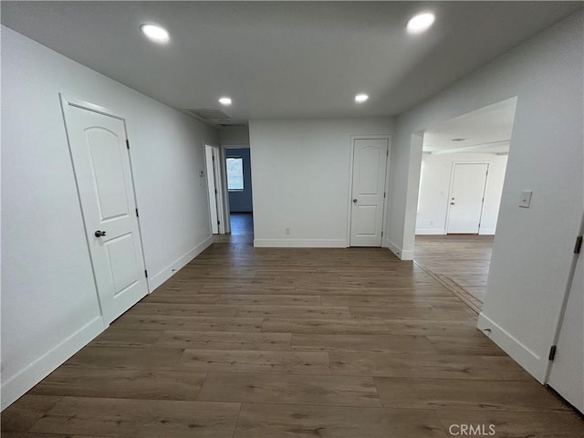 hallway featuring hardwood / wood-style floors