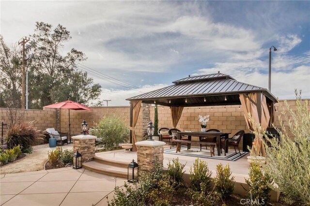 view of patio / terrace with a gazebo