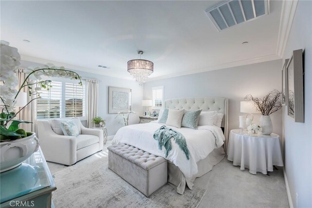 carpeted bedroom featuring crown molding and multiple windows