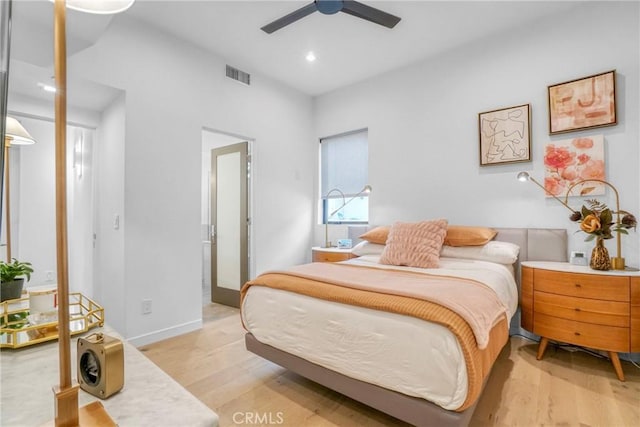 bedroom featuring light hardwood / wood-style flooring and ceiling fan