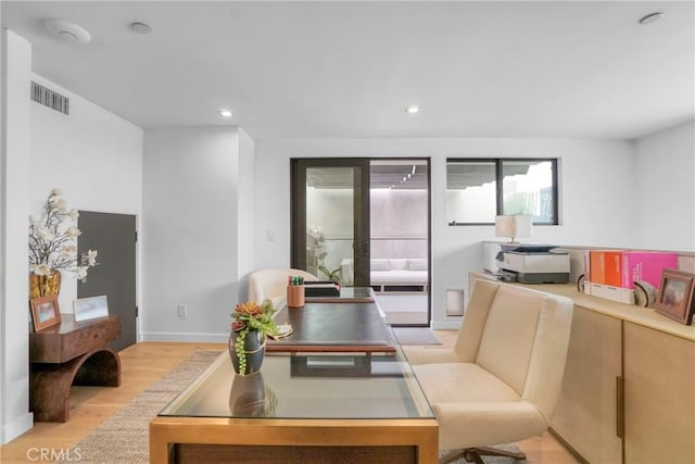 living room featuring light hardwood / wood-style floors