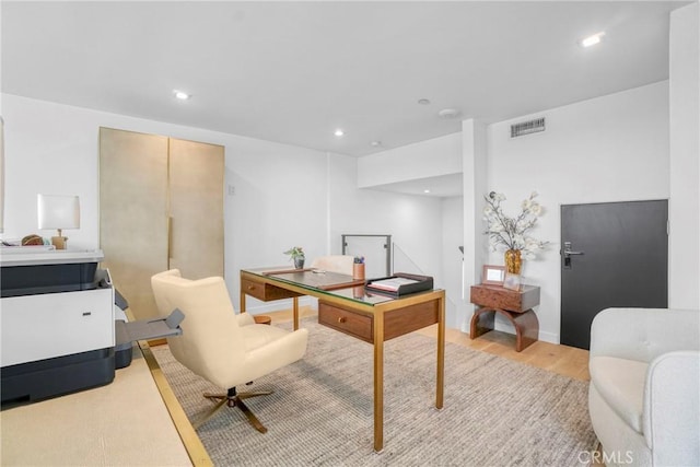 home office featuring light hardwood / wood-style floors