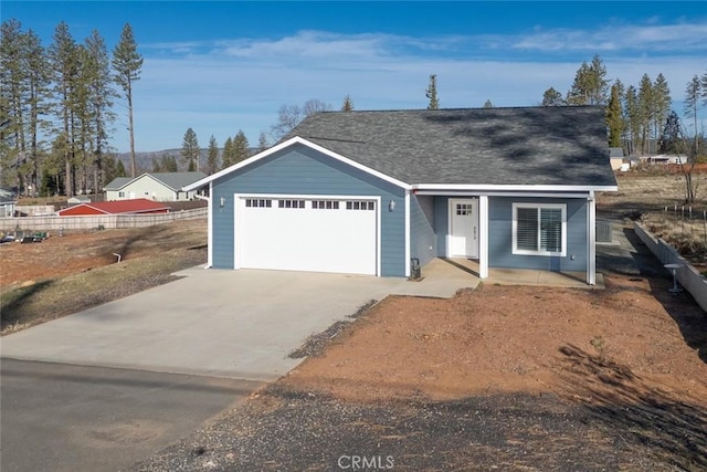 ranch-style house featuring a garage