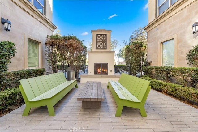 surrounding community featuring a patio area