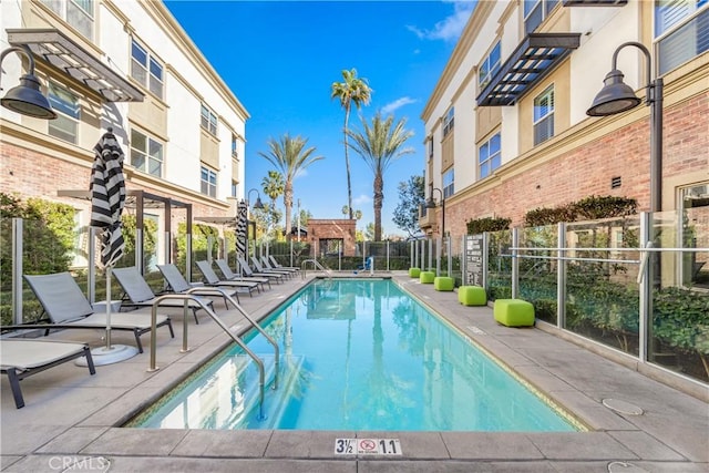 view of pool featuring a patio