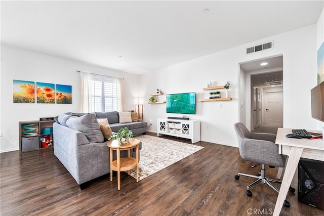 living room with dark hardwood / wood-style flooring