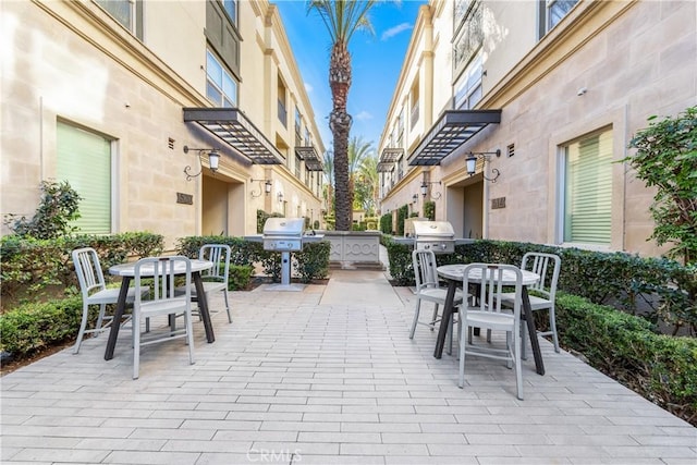 view of patio with a grill