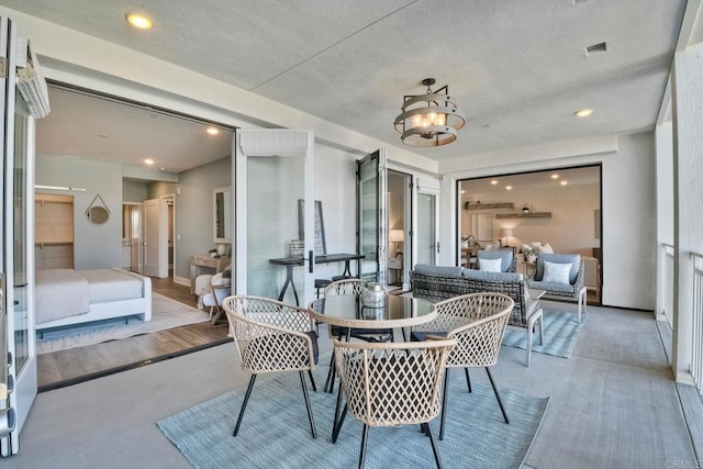 dining space featuring a chandelier