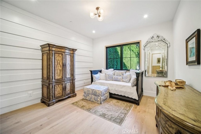 sitting room featuring light hardwood / wood-style floors