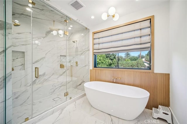 bathroom with wood walls and plus walk in shower