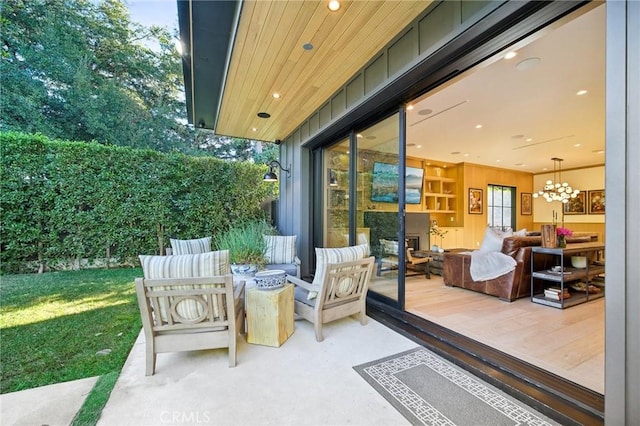 view of patio / terrace featuring a fire pit