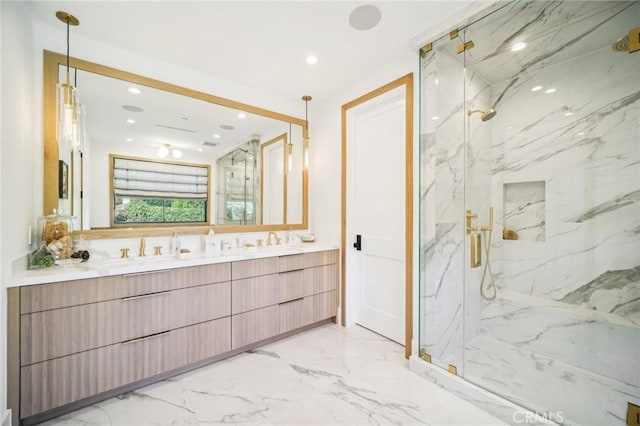 bathroom featuring vanity and a shower with door