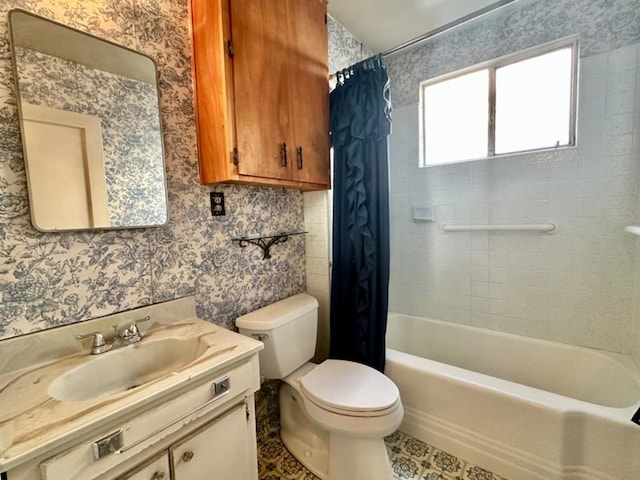 full bathroom featuring vanity, toilet, and shower / tub combo with curtain