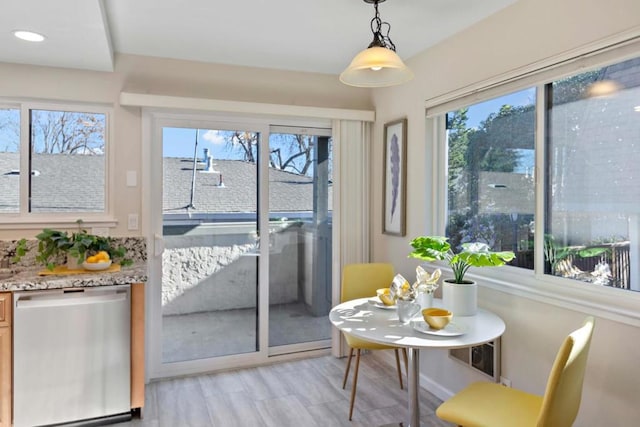 sunroom / solarium with plenty of natural light