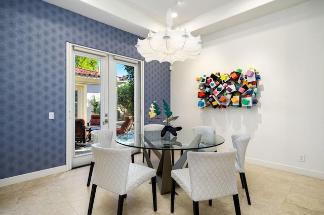 dining room with a notable chandelier