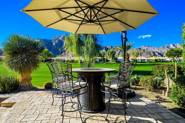 view of patio with a mountain view