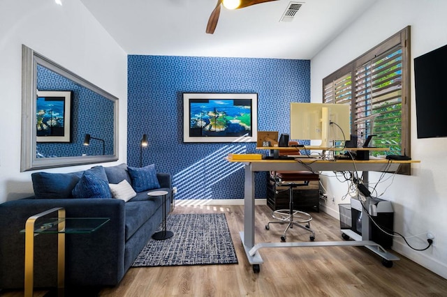 office space featuring ceiling fan and wood-type flooring