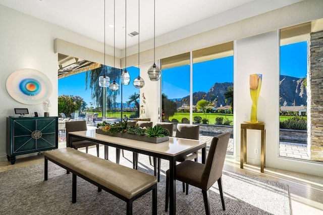 dining area with a mountain view