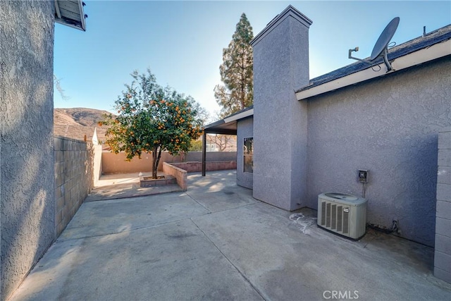 view of patio / terrace with central AC unit