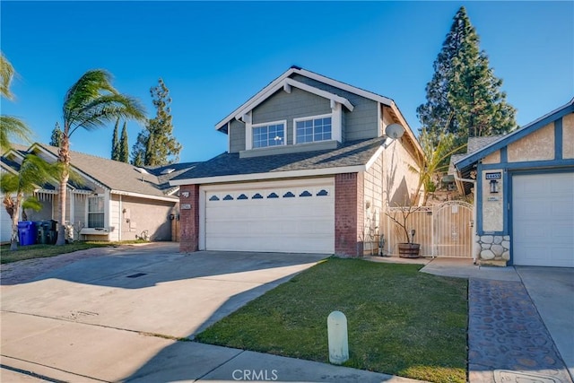 view of front of house with a front yard and a garage