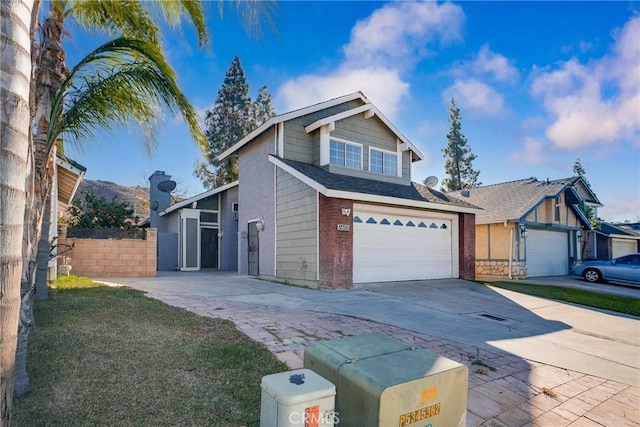 view of front facade with a front lawn and a garage