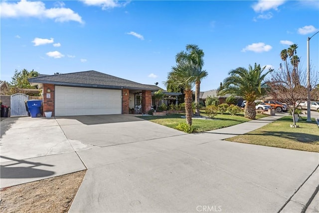 ranch-style house with a front lawn and a garage