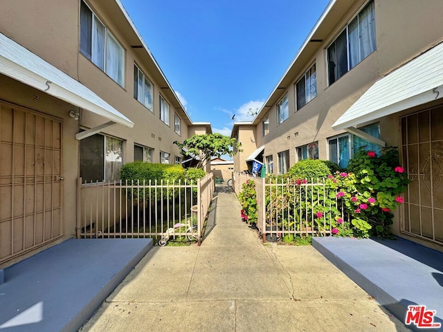 view of home's community with a patio area