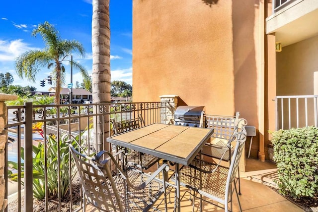 balcony featuring outdoor dining space