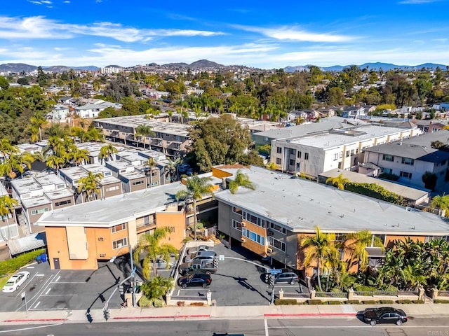 birds eye view of property featuring a mountain view