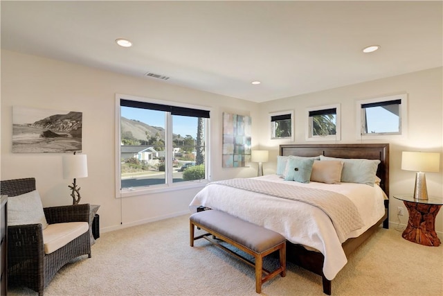 carpeted bedroom featuring a mountain view