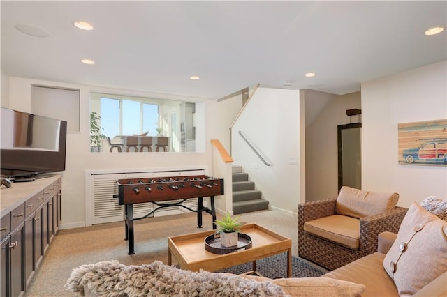 living room featuring light carpet