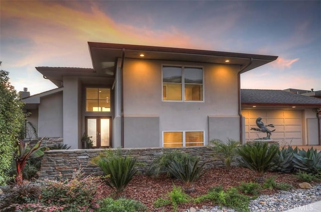 view of front of home with a garage