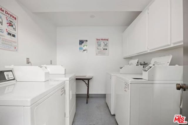 laundry room with independent washer and dryer