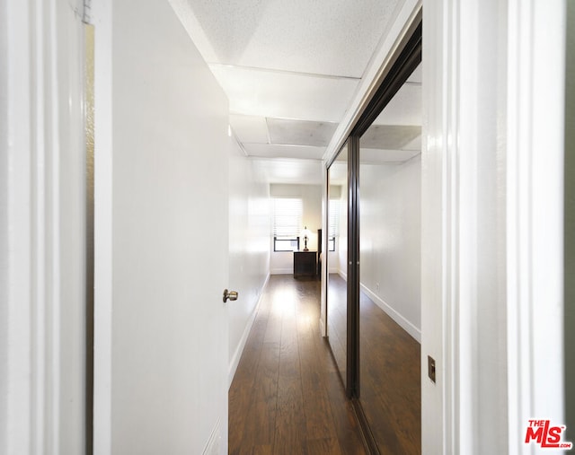 hall featuring dark wood-type flooring