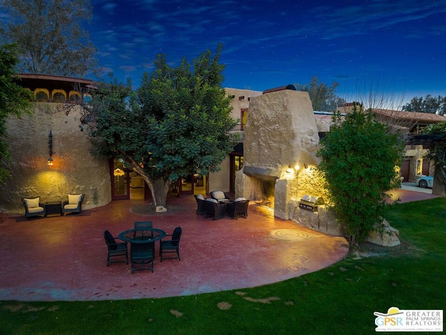 view of patio featuring exterior kitchen