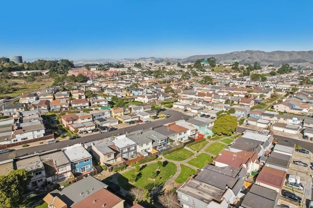 drone / aerial view featuring a mountain view