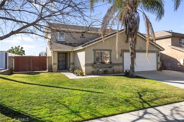 view of front of home with a front yard and a garage