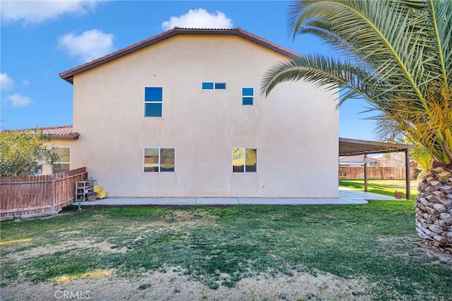 view of property exterior with a yard