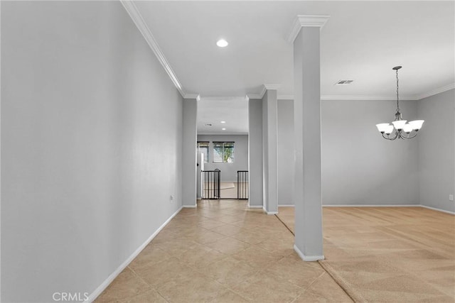 hallway featuring crown molding and a notable chandelier