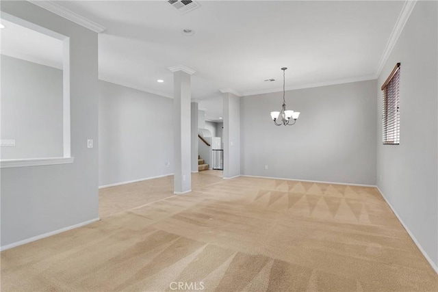 empty room with light carpet, ornamental molding, and a notable chandelier