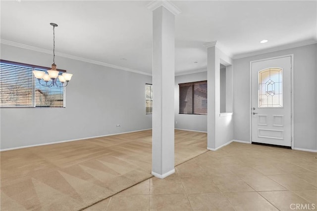 foyer with ornamental molding, light tile patterned floors, and a notable chandelier