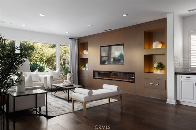 living room with dark wood-type flooring