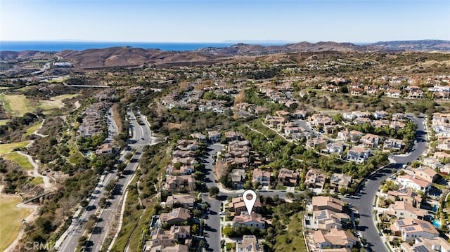 drone / aerial view featuring a mountain view