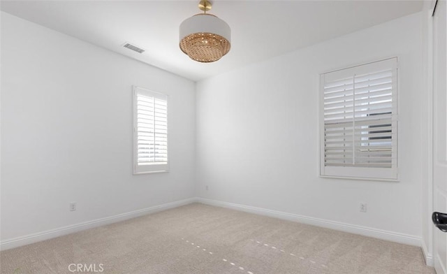 view of carpeted spare room